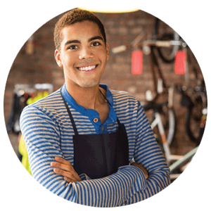 Image of a teen male at work in a store